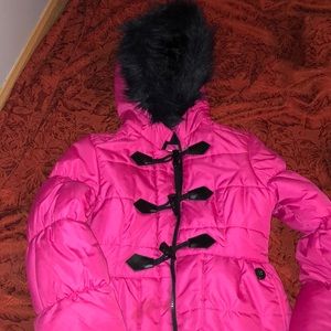 Pink Fluffy Jacket with a fur hood.
